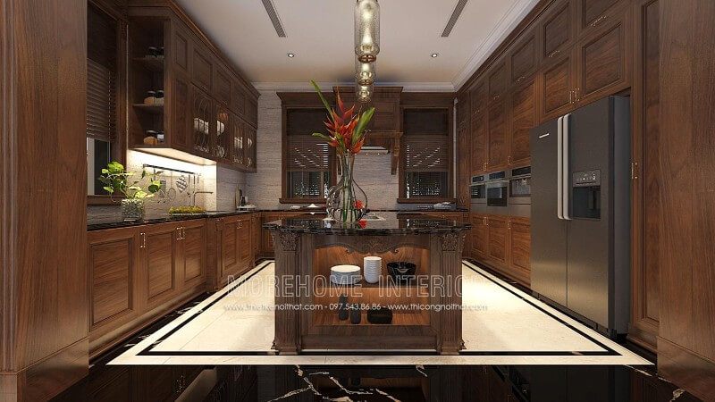 Tủ bếp chữ L gỗ tự nhiên được thiết kế một cách linh hoạt và khéo léo, kết hợp bàn bàn đảo được đặt ở chính giữa tạo sự bề thế, sang trọng cũng như đẳng cấp của chủ nhân ngôi nhà